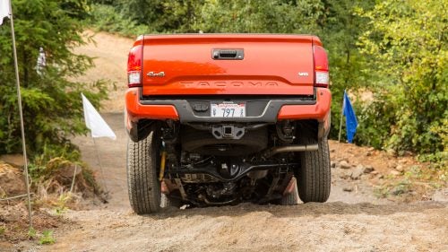 The 2016 Tacoma got some rear-end upgrades, including a tailgate that’s easier to open and close, and a three-piece bumper that makes repairs simple: If you dent one section, you can replace it without having to buy an entirely new bumper.
Toyota is also offering an aftermarket trifolding locking tonneau—a sturdy locking cover that fits flush with the top of the bed—that lets you convert the truck into a giant, mobile gear locker.