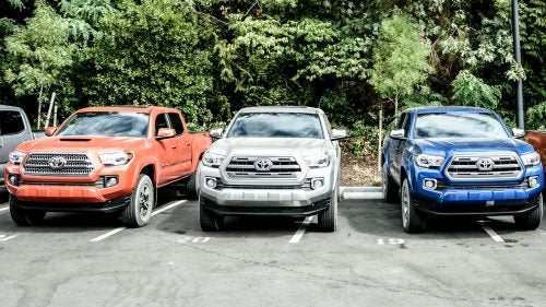 For 2016, Toyota offers multiple grilles depending on whether you want a “street” or off-road look (the silver truck has the off-road version, and the orange truck the urban-styled edition). The hood scoop is nonfunctional and comes standard on the TRD Sport and TRD Off-Road models. We dig the orange and beige editions, but the truck looks excellent in blue, too.