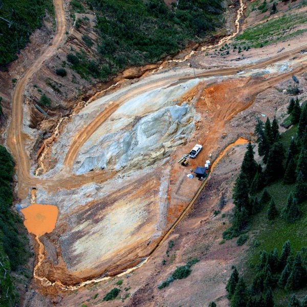 Waste water continues to stream out of the Gold King Mine on August 11, five days after the initial spill.