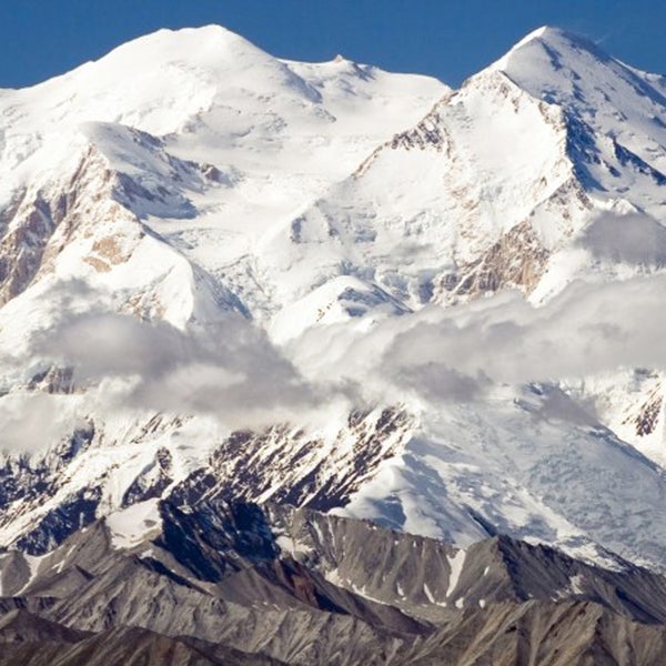 “No place draws more public attention to its exact elevation than the highest peak of a continent,