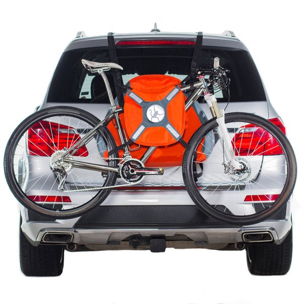 TrunkMonkey inflates via an enclosed pump, then secures to the trunk or rear hatch of your car.