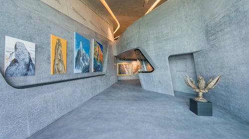 The interior and exterior panels of Corones are made from a light shade of glass-reinforced fiber concrete to reflect the hue of the Dolomites’ craggy limestone peaks, creating a subtle and cohesive presence within the mountainside. Exhibits include a series of tools, photographs, and objects from Messner’s mountaineering career.