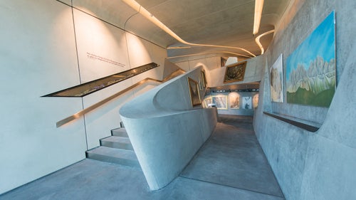 Opened in July 2015, the final installment of the MMM project, Corones, is built on the top of the Kronplatz mountain (Plan de Corones) at an altitude of 7,463 feet in the Mount Kronplatz ski resort. Renowned British architect Zaha Hadid designed the 3,280-square-foot exhibition dedicated to traditional climbing history and the discipline of mountaineering.