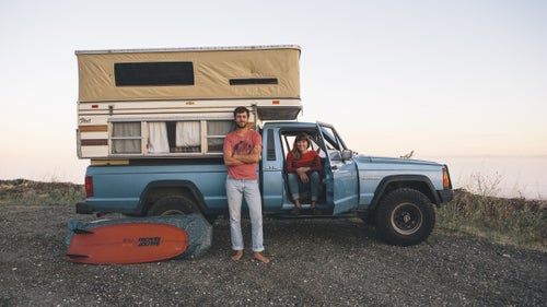 It’s no secret the Internet is in love with campervans, the nomadic life, and the sought-after simplicity of living on the road. It only takes two to four seconds of scrolling to find a #vanlife picture, but there is often very little explanation or any verification if what you’re seeing is actually real. We asked photographer Jeff Clark, who travels around in his customized Sprinter, to document a few of the best rigs and personalities he came across while spending the summer on the California highways. Turns out there is a lot to love. Here, Clark shares a few of his favorite setups and encounters with people who live on the road.
The Ride: 1991 Jeep Comanche 4x4
The Faces: Trevor Gordon is a surfer, brand ambassador, and photographer. Maddie Joyce is an illustrator and designer. They just got married and live in Santa Barbara, California.