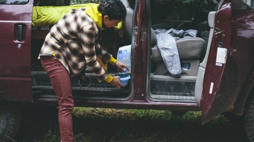 Fun Facts: The Astrovan has a small lift, which allows the couple to treat the rig like a truck and get some places other vans can’t. They cook outside on a collapsable table and chairs, use a cooler to keep food fresh, and park it wherever they feel comfortable.