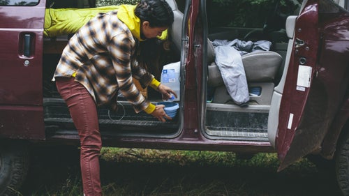 Fun Facts: The Astrovan has a small lift, which allows the couple to treat the rig like a truck and get some places other vans can’t. They cook outside on a collapsable table and chairs, use a cooler to keep food fresh, and park it wherever they feel comfortable.