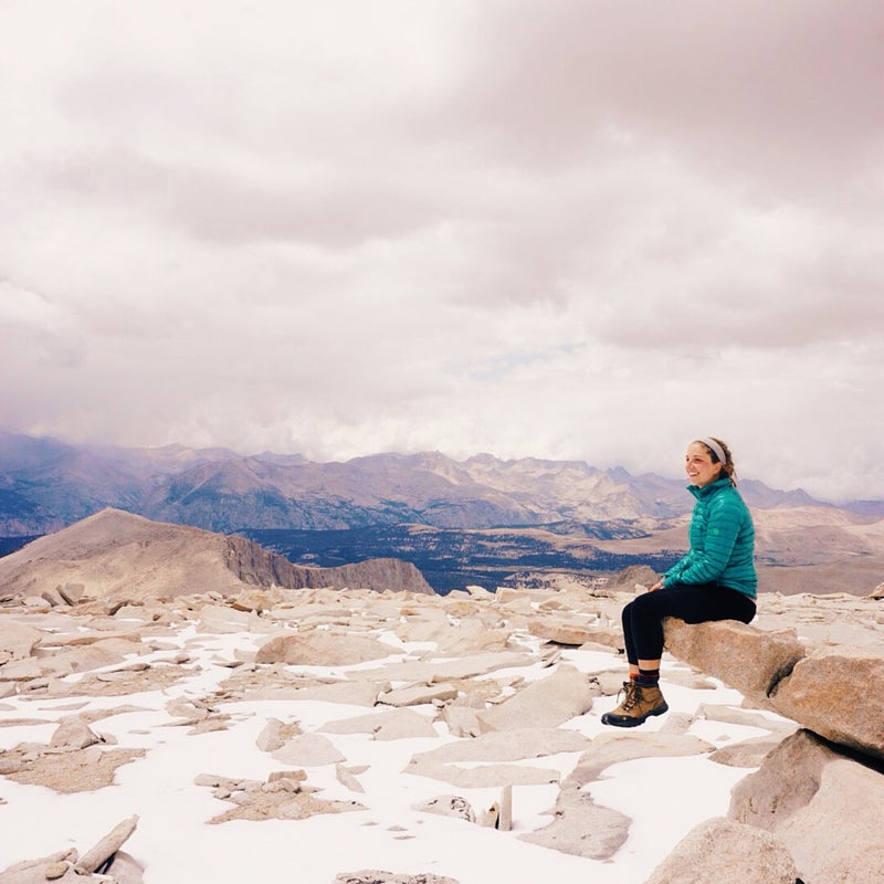 Without Instagram, I would not have been able to connect with so many rad clients and friends. Instagram is also a lot of fun. I’m a backpacker who loves creating landscape images and star photos. I’m a wedding photographer who travels all over the world to capture people in love saying their vows in jaw dropping places. I’m a travel photographer who loves eating gelato in Italy, chocolate croissants in France, and Malay cuisine in South Africa. I’m a born and bred California girl who thrives on the ocean and rides a pink skateboard. My account is a reflection of all of the different sides of me and I have it to thank for many of the photography jobs that I hold nearest to my heart.
This photograph is a selfie I took of myself right after summiting Mount Whitney. I still had one night and roughly ten miles before I would be back in civilization, but the top of the peak is the official end of the John Muir Trail. After 211 miles of solo hiking, I felt euphoric to have actually made it.
