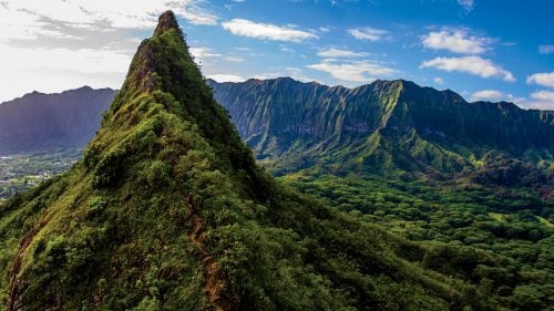 In 2014, Moss, who lives in San Jose, California, overcame his fear of heights while solo-hiking the two-foot-wide paths of Hawaii’s Koolau Range in five days—record time. Last February, he captured his friend Hunter Williams summiting the steepest peak of the nearby Olomana Trail. “Just as he reappeared, the clouds parted,” Moss says. “Seeing him along that crumbly, dangerous ridge line reminded me of what I’d gone through and of everything I was doing as a mountaineer in Hawaii.
THE TOOLS: Canon EOS 7D, Tokina 10-17mm f/17 lens, ISO 100, f/5.6, 1/250 second