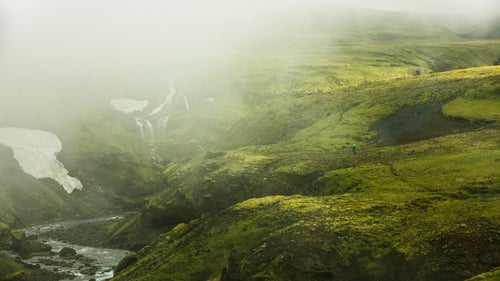 High above Skógafoss Falls and beyond the reach of the shutterbug tourist lies a primitive trail that traces the edges of the river gorge. Countless waterfalls line the edges of the gorge, filling the river with runoff from glacial ice and snow.