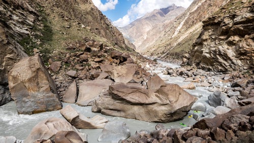 The huge boulder in the center of the frame is called Manhattan Rock. The name was given to it by a brave group of Russian rafters who first descended the canyon sometime in 1990.