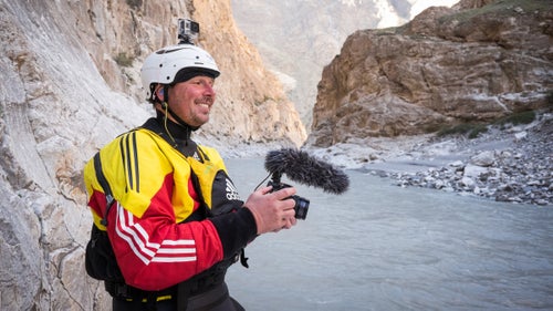 Videographer and paddler Olaf Obsommer takes time to document the canyon on the upper stretches of river.