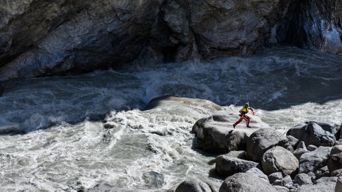 Paddler Sam Sutton takes a leap of faith. One of the most dangerous aspects of paddling the Sary-Jaz was moving around on shore. Landslides and unsteady rocks are common in the canyon due to the powerful river and surrounding mountains.