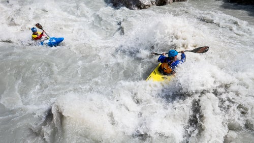 Paddlers Thilo Schmitt and Fabian Dorfler battle the powerful water.