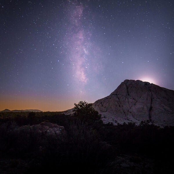 Moonset over the volcanic tuff mountain of Crystal Peak, Utah.