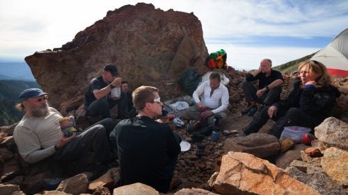 German climatologist Andreas Pflitsch (second from right) met McGregor (left) and Cartaya (third from right) at the International Workshop on Ice Caves in Idaho Falls. Though Pflitsch had never studied glacier caves, he was interested by the dramatic changes happening within the Sandy Glacier and agreed to visit in June. In the five days he was at the glacier, he went into the caves up to three times a day, measuring airflow and temperature.