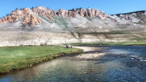 We dashed onward in the Soviet bread loaf. At each vista and hilltop, we’d see wicked-looking ovoo, ancient shamanistic offerings to the sky gods. We stopped at this river for lunch and tried to fish a little—we had heard of the mighty taimen—but no cigar.