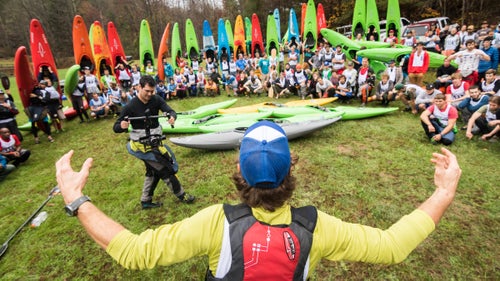 Paddlers gathered around race organizer Jason Hale. Hale, who was part of the inaugural race and holds the record for participating the most number of times (18), is the spiritual leader of the race. In his outgoing voicemail message, he says, “A clean river is a like a mean shiver. Who's racing, who's chasing, who’s placing? Going to be on top, don't stop. Go left, go fast. Leave a message.” His pre-race speech—part Braveheart monologue, part pep talk—is the stuff of legends, and includes the warning: “You will hear a roar like you’ve never heard before!”