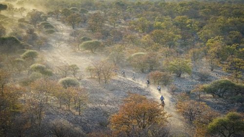 There were no markers showing us where to go. Just other riders’ tracks, GPS, a sat-phone for each team of 15 to 20, walkie-talkies, and an evac helicopter overhead, which doubled as a lookout for elephant herds. “Don’t worry about getting lost,” Friedman told me, “because that’ll mean you can get an extra dozen miles in.”
