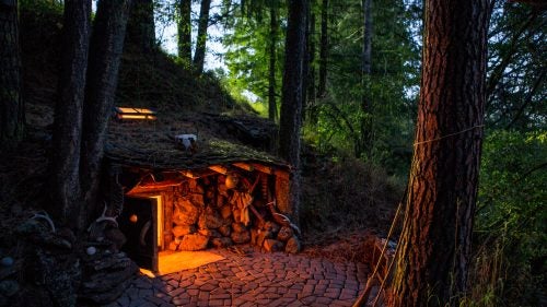 Joseph, Oregon: One of two underground structures on the Pacific Northwest property. Each hut is dug out from the hillside and supported by wood beams.