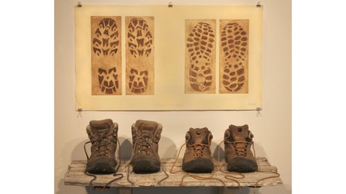 To create these prints of his Merrell and Scarpa boots, Rue stepped on a copper plate covered in an acid-resistant coating while wearing his hiking boots. He then dipped the plate in an acid bath, which ate away at everything around the boot imprint. After inking the engraved plate and running it through a press, Rue displayed these etchings with the actual boots, each of which has covered over 1,000 miles. “In my most recent show I had my trekking poles and my sleeping bag,” he says. “Nothing has been retired yet except the boots, which have holes and smell bad.”