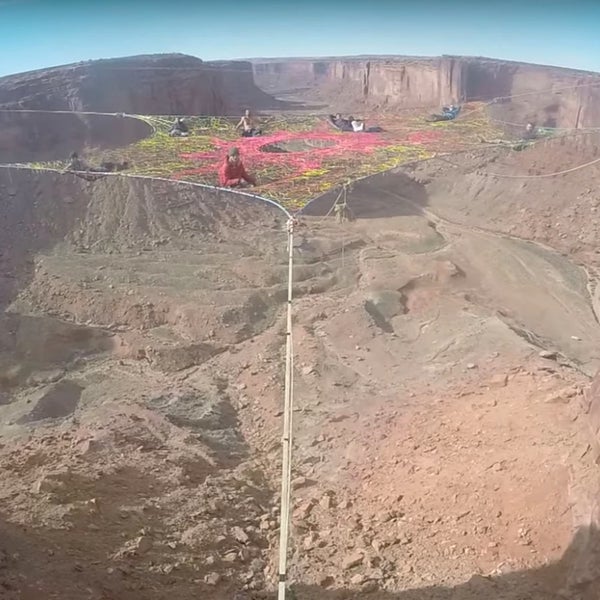 According to Lewis' YouTube description, more than 100 people helped build the two space nets, which used more than 21,000 feet of cord.