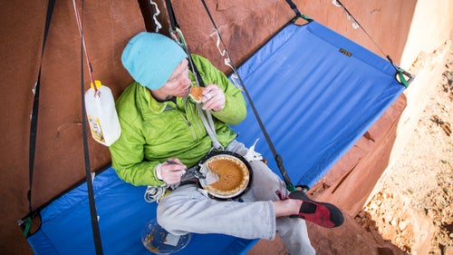 Ryan Davis and his partner hauled a Creeksgiving feast up the first pitch of King of Pain tower, behind the Bridger Jack campgrounds. After finding a suitable place to set up their portaledge, they celebrated with pumpkin pie and eggnog.