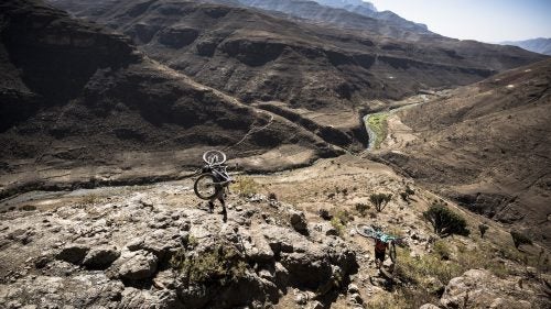 Foot traffic and livestock created the trails that we followed, and we spent long stretches negotiating loose, steep hillsides with our bikes balanced on our backs. It was the price for accessing remote villages that few travelers ever see.