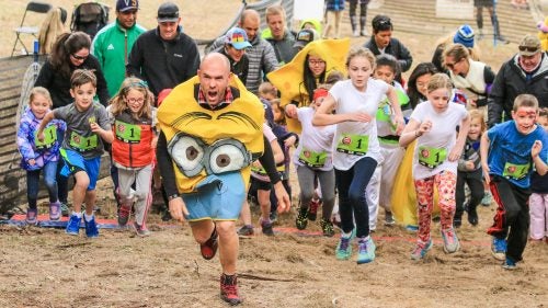 A minion leads out the free kids race held Saturday afternoon.