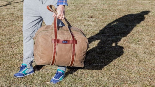 Nashville’s Tucker & Bloom recently updated its classic weekender with a weather-resistant, U.S.-made waxed canvas. But plenty carries over from previous editions, including the bomber shearling shoulder strap and bright nylon liner, which makes finding that sweater easy. It’s edged with veg-tanned leather sourced from Kentucky. We’re excited to see what this bag looks like in five years.