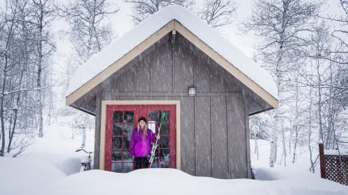 When you live in a tiny home in the mountains, you need a gear shed. There was no way I could fit all my toys in the house, so skis, boots, poles, bikes, surfboards, ropes, climbing gear, sleeping bags, tents, chairs, stoves, kiteboard and kite, disco balls, Rollerblades, scuba masks, flippers, wetsuits, teepees, bean bags, gardening supplies, tractor equipment, and sled tools all live out here. In the summer, I turn it into a screen-printing shop.