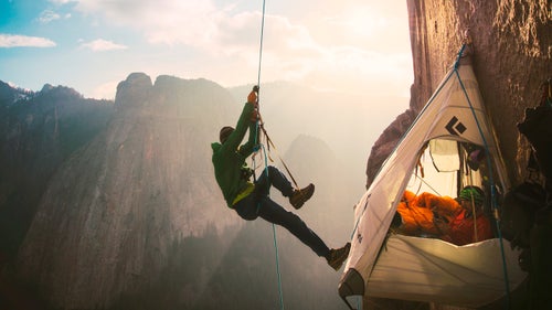 Over the past 12 months we’ve seen speed records fall, first ascents set, daring expeditions attempted, and some outright crazy outdoor stunts. From the historic free climb of the Dawn Wall to the first government-sanctioned catamaran race between Florida and Cuba, we bring you our favorite badass adventures of land, sea, and air from 2015.
Caldwell and Jorgeson Free Climb the Dawn Wall
On January 14, as the sun set in Yosemite National Park, Tommy Caldwell and Kevin Jorgeson completed what is arguably the most difficult ascent in the history of rock climbing. The duo remained on the Dawn Wall on El Capitan for 19 days, climbing 3,000 vertical feet along widely spaced, razor-thin granite holds. Their prize: the first free ascent (using ropes only to catch falls) of the route. Reflecting on the climb months later, Jorgeson described the difficulty: “I climbed brick façades as a kid. You’d kind of stick your fingers in there. But sink in those bricks so they barely stick out from the wall. That’s what you’re dealing with.”