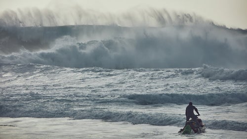 McNamara, Nazaré’s most well-known surfer, gets towed out to sea. Because of the sheer force and size of the waves and the knowledge required to navigate those conditions, jet skis at Nazaré are piloted by other surfers. “It’s almost a game of chess,” Silva says of operating jet skis in these waves. “They try to feel for an opening, but if they can’t pass through, they’ll have to turn around and try again. It’s hard work.”