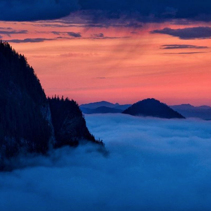 After hard rain, the weather clears enough to display a colorful sunset.