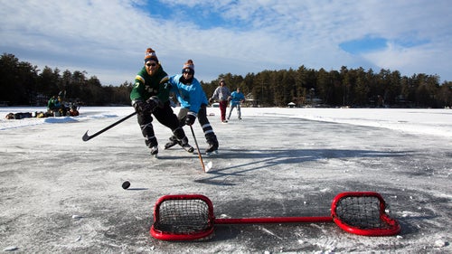 “Each pond has its own rules,” including what constitutes a goal, says Haines. Over his three weeks of travel, Wynia saw teams aiming their puck toward boots, holes dug into the ground, and traditional nets. “There usually aren’t goalies in pond hockey, so the goal has to be small and hard to score on,” says Wynia. “People aren’t taking shots from halfway because the ice isn’t smoothed out—you have to be close or it will hit a rough spot that will take it off course.”