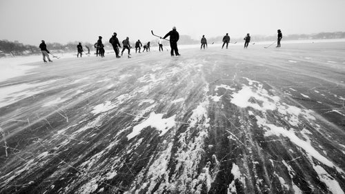 Wynia remembers this afternoon on Monona Bay in Madison, Wisconsin, as bitterly cold, well below zero degrees. “There was a lot of wind blowing snow around, but a huge group of people who met every week were still playing,” he says.