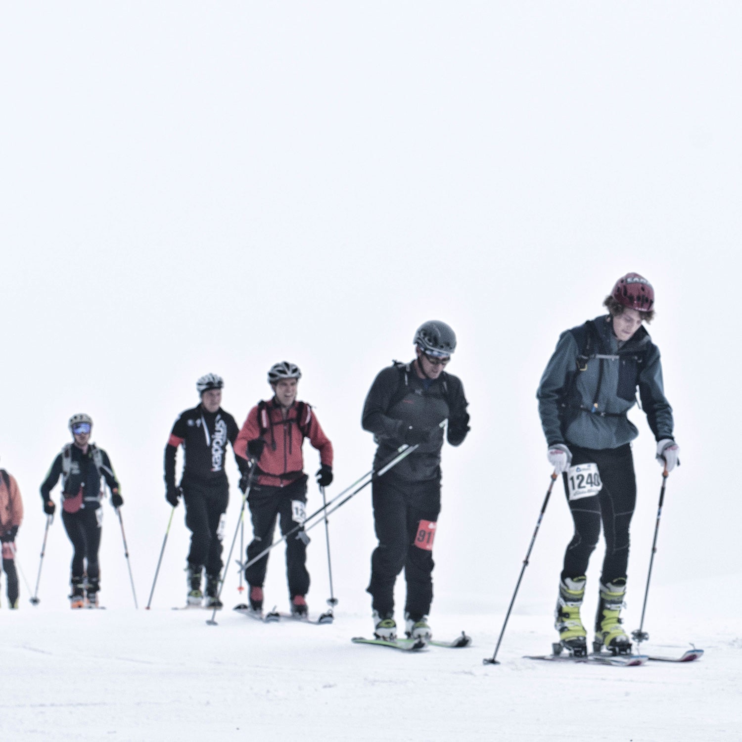 SKIMO competitors during the 2013 Winter Mountain Games in whiteout conditions on Vail Mountain.