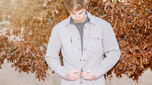 Call it what you want—a shacket, shirt jac, or overshirt—the insulated button-down has recently exploded in popularity. It’s easy to see why. When it’s not cold enough for a full-on parka, this outerwear hybrid offers warmth and, often, water resistance, with a casual, “I’m not coming off an expedition” look. Almost every brand has its own take, but we’ve rounded up our ten favorites.
Photo: Western Rise Caribou Quilted Shirt ($139)
Western Rise caught our attention at last summer’s Outdoor Retailer as one of the industry’s most innovative new small brands, and its Caribou shirt has kept us intrigued. A water-resistant face fabric protects the recycled poly/coffee insulation. That’s right: every Caribou uses 12 plastic bottles and three cups’ worth of used grounds to keep you toasty.