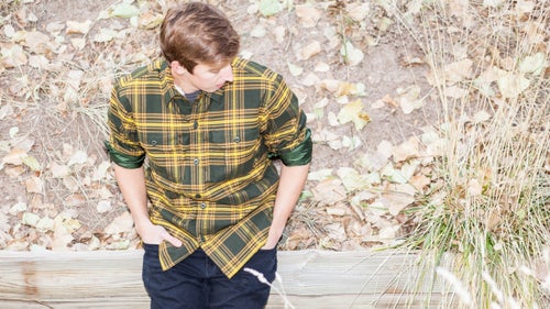 This shacket has its roots in lumberjack culture, which is exactly what we think of when we see the classic plaid pattern. But unlike traditional flannel, the fabric on this piece is entirely synthetic, mixing a modern polyester with a stretchy elastane for enough mobility to swing an ax.