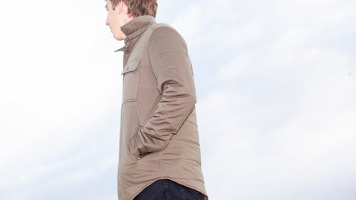 The Flexible Insulated Shirt from Japanese company Snow Peak, with its minimalist, understated design, is the most fashion-forward piece here. It also performs great. The stretchy polyester face and interior fabric gave us a huge range of motion, and its airy feel had us putting—then keeping—it on.
