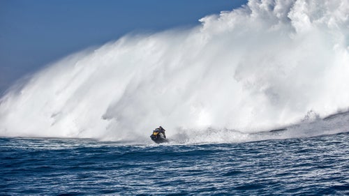 Less than a decade ago, surfers wouldn’t even entertain the thought of paddling into Jaws. It was assumed the only way to catch waves that big was via a jet ski. Today, Jaw is regularly paddled into. “Big-wave surfers’ testosterone has gone through the roof,” says Moss. Jet skis, however, are still employed for safety and to shuttle photographers. Here, Danilo Couto, an accomplished big-wave rider, narrowly escapes the impact zone.