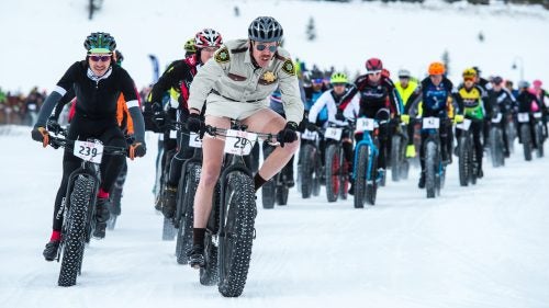 Last week, 260 racers lined up to compete in Crested Butte’s inaugural Fat Bike World Championships. The race is a world championship in name only, as it’s not sanctioned by cycling’s international governing body, the UCI, but we don’t care: the photos from the event make it look like about the most fun you can have on two wheels. Like all the very best bike races, this one attracted lots of crushers (including pro roadie Robbie Squire), without taking itself too seriously (note the Fat Bike Worlds branding iron, copious number of kegs, and costumed riders). Professional photographer Eddie Clark went to the comp for us and came back with these 13 shots of fatties in their element.
Photo: Elite men’s racer and Crested Butte local Jordan Williford, from the Brick Oven, laid down the law early, stringing the field out from the starting line.