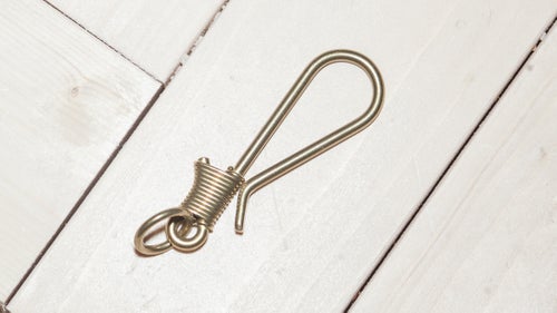 Take off those old plastic discount cards, throw away the keys you don’t use, and use this clip to keep the remaining essentials organized. Made from solid brass, the clip adds a touch of style to an otherwise forgotten part of your everyday carry. Bonus: it’ll develop a custom patina over time.
