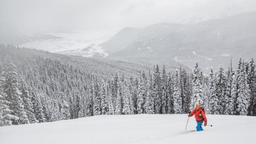 Climbing the skin track in Red Coon Glades, with Crested Butte in the background.