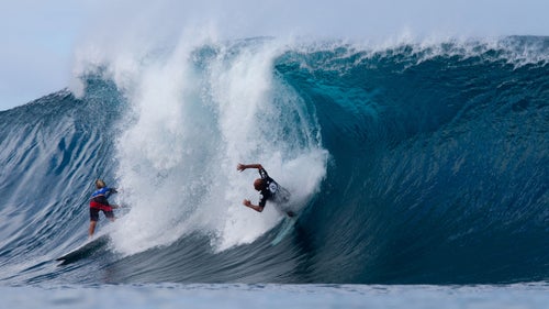 Even with his amazing contest run, Kelly Slater (right) got caught a few times. To his left, Jack Robinson negotiates the Backdoor section.