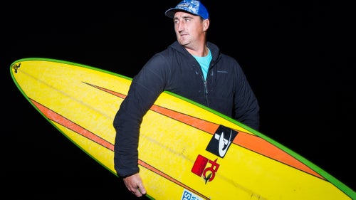 Ben Wilkinson of Narabeen, New South Wales, Australia, with his backup 9'6” surfboard by FCD.