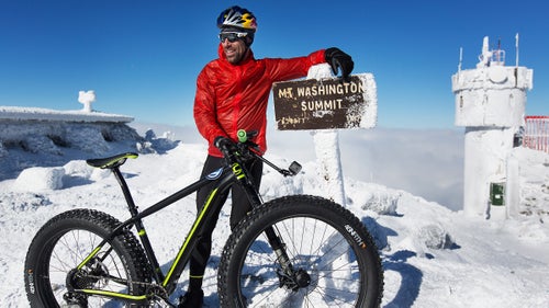 Johnson poses for a portrait on top of Mount Washington.