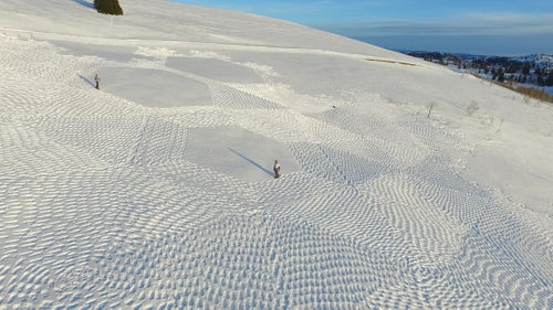 The meticulous, repetitive snow art process has a meditative quality to it, and Beck will occasionally listen to music as he draws lines in the snow. “It’s a privilege to have a job that I enjoy,” he says. “It’s nice to be out in the mountains on a nice day.”