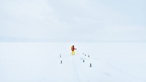 Pohl stands on the dock near the East Channel Lighthouse looking out on a snow covered and frozen Lake Superior. The local guides from the Upper Peninsula, who referred to themselves as UPers (pronounced “yoopers”), assured the team that it’s safe to travel on the ice, so long as it’s at least 6 iches thick.