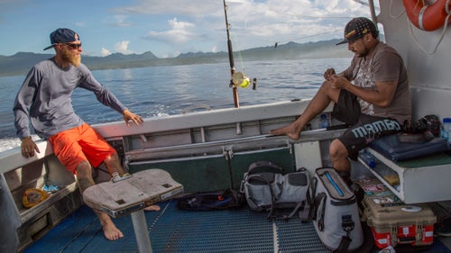 We worked with various locals, none of whom were professional guides or anglers, to try new angles. Aidi (right), a chef from Papua New Guinea working at a nearby resort, joined us for a few days. The day started out golden and clear, but by mid-morning the team was caught in a gut-wrenching squall. We continued to fish, catching one wahoo after a long morning of seasickness.