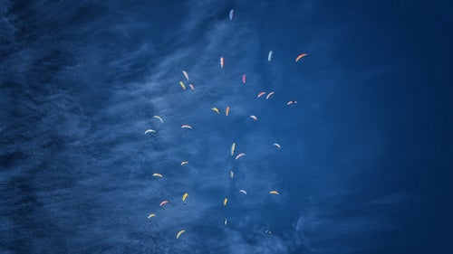 Over the winter, Matt Segal and I—both professional climbers and beginner paragliders—headed down to Mexico with the pie-in-the-sky goal of flying off of Pico de Orizaba. At 18,400 feet, the volcano is the highest peak in Mexico, and third highest in North America.
We stayed in world-class paragliding destination Valle de Bravo, known for it’s consistent and adventurous flying conditions. We waited in Valle for a weather window to fly off Orizaba, which was tough given that a “100-year storm” was buffeting the volcano with 80 mph winds and copious snow. But towards the end of our month in Mexico, winds subsided and Matt and I, along with our paragliding instructor, Matt Henzi, climbed up and flew off of Pico de Orizaba. Not bad for less than a year of paragliding! “Better lucky than good,” as I like to say!
I directed a short film of the adventure called The Fledglings, which was sponsored by the North Face. A longer, uncut version will hit film festivals this summer.
Photo: In training for Pico de Orizaba, Segal and I enter a “gaggle” of 30 paragliders all circling up in one thermal. A thermal is a mass, bubble, or column of rising air traveling upward from the ground.